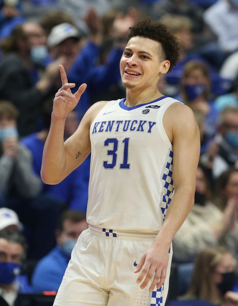 Kentucky’s Kellan Grady celebrates after making a three against High Point.Dec. 31, 2021