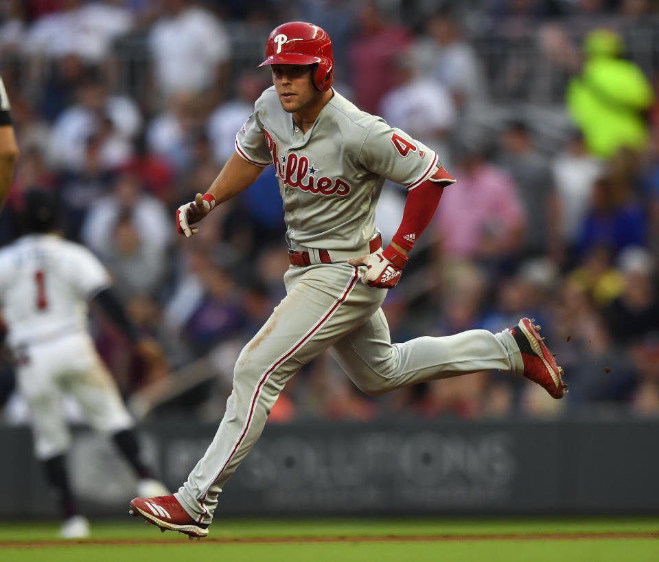 Philadelphia Phillies' Scott Kingery runs to second base during his two-run line drive double to right field in the third inning of a baseball game against the Atlanta Braves, Saturday, June 15, 2019, in Atlanta. (AP Photo/John Amis)