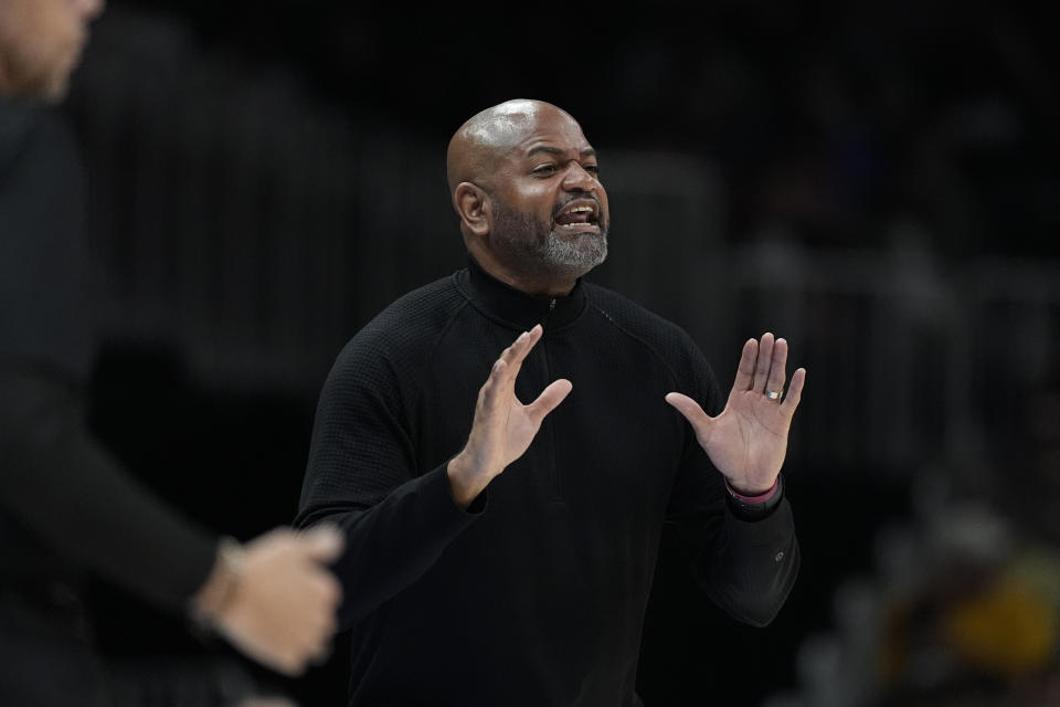 Cleveland Cavaliers head coach J.B. Bickerstaff argues with an official during the first half of an NBA basketball game against the Atlanta Hawks Wednesday, March 6, 2024, in Atlanta. (AP Photo/John Bazemore)
