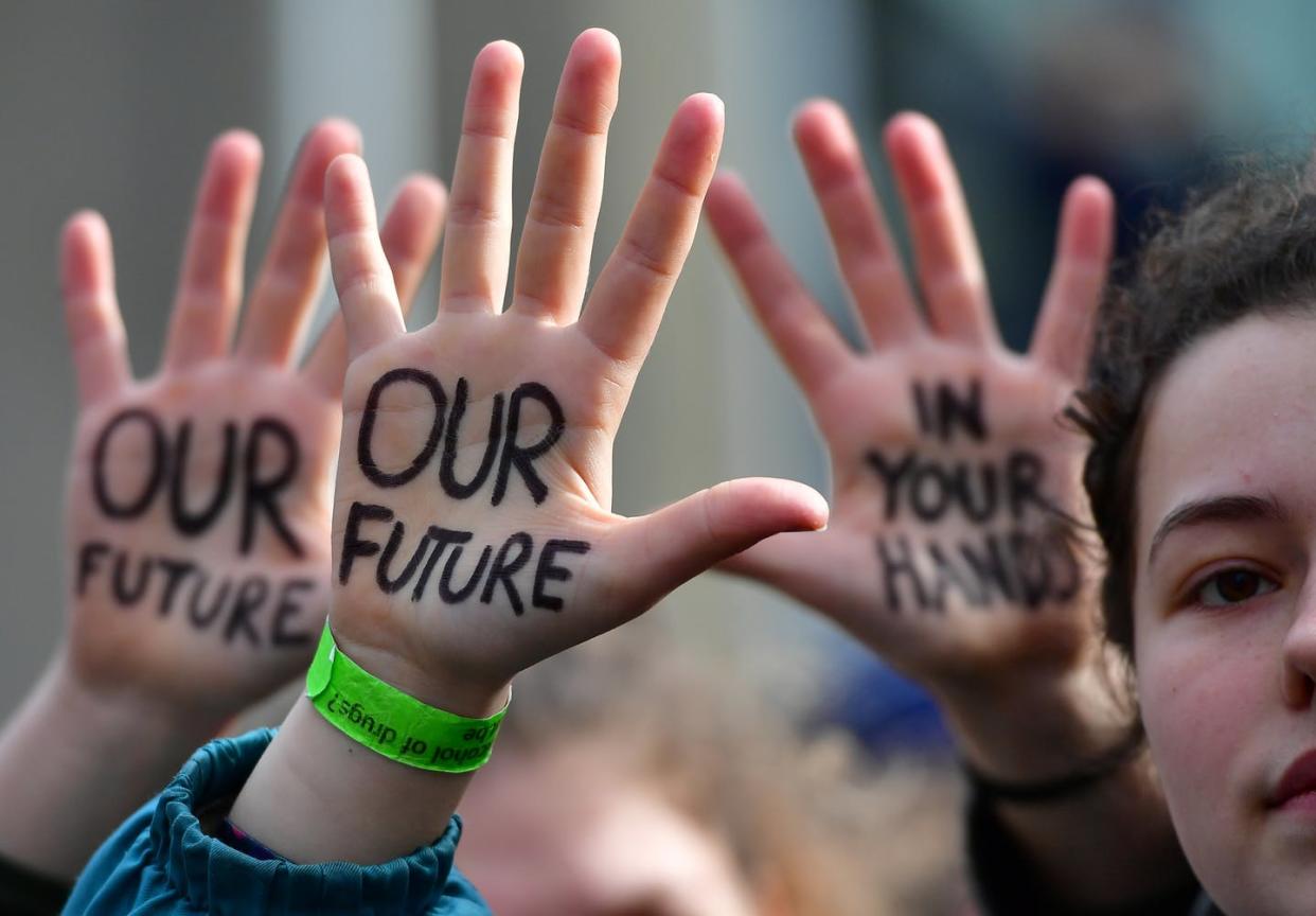 <span class="caption">Actions today affect the world these young people will live in.</span> <span class="attribution"><a class="link " href="https://www.gettyimages.com/detail/news-photo/students-take-part-in-a-march-for-the-environment-and-the-news-photo/1126526949" rel="nofollow noopener" target="_blank" data-ylk="slk:Emmanuel Dunand/AFP via Getty Images;elm:context_link;itc:0;sec:content-canvas">Emmanuel Dunand/AFP via Getty Images</a></span>