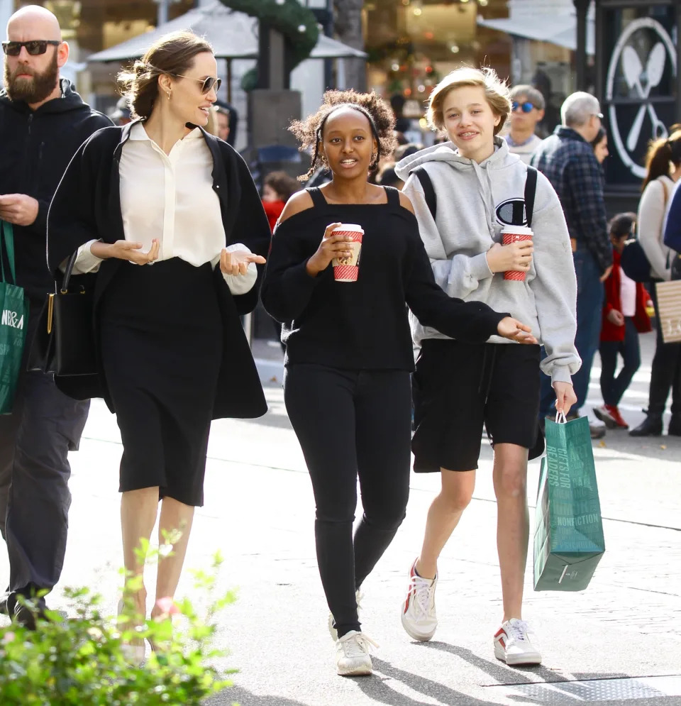 Angelina and daughters Zahara and Shiloh shared a laugh as they did some last-minute Christmas shopping at The Grove mall in Los Angeles on December 22, 2019. They enjoyed hot chocolate after stopping by Barnes and Noble to purchase some books.