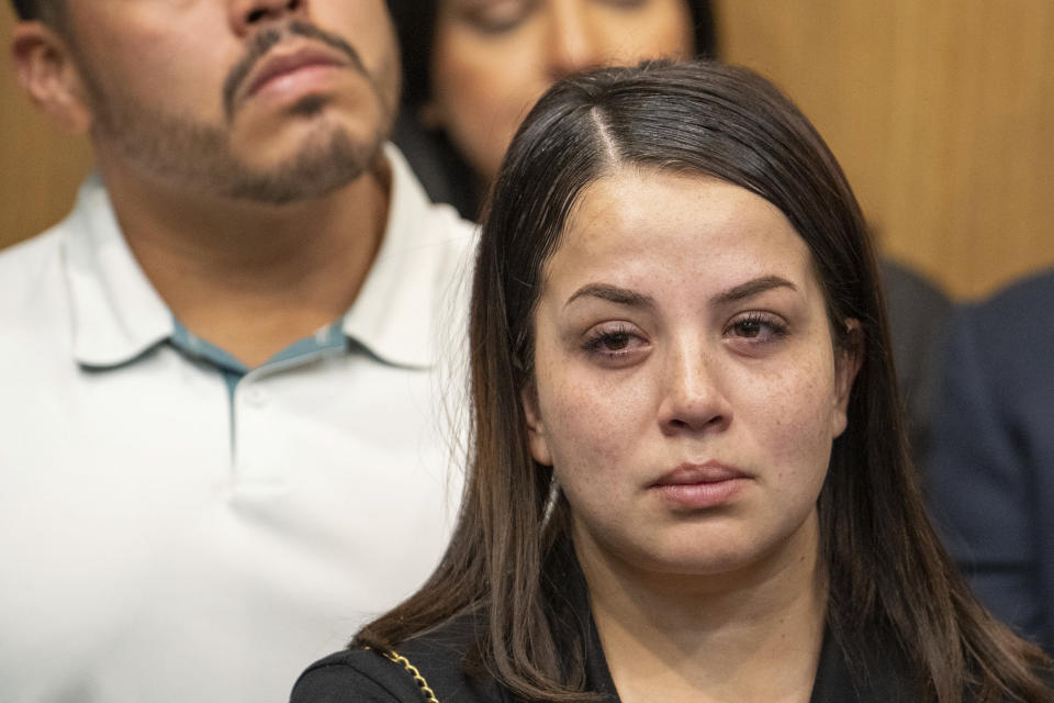 FILE - Wendy Alvarez, mother of Arlene Alvarez, 9, who died after being shot in February of this year, listens during a press conference, Tuesday, July 19, 2022, at Crime Stoppers in Houston. Tony Earls, accused of fatally shooting a 9-year-old girl when he was robbed at a Houston ATM in 2022, has been indicted Tuesday, April 23, 2024, for murder in her death. The indictment comes nearly two years after another grand jury had declined to indict him in the death of Alvarez. (Mark Mulligan/Houston Chronicle via AP)