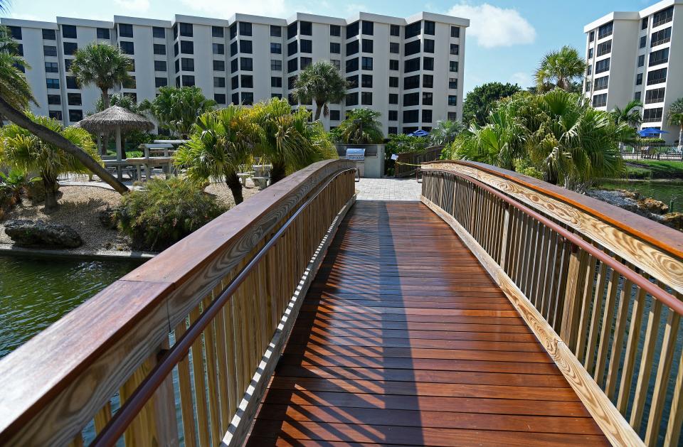 One of the wooden bridges on the interior lake at Gulf & Bay Club.