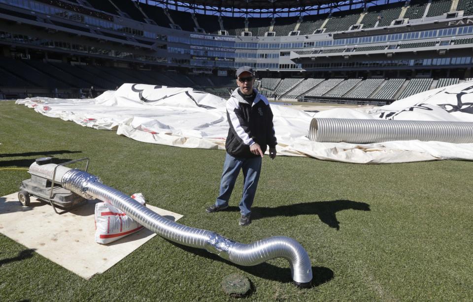 In this Monday, March 17, 2014 photo taken in Chicago, Chicago White Sox baseball team head groundskeeper Roger Bossard speaks about preparing the teams home field for opening day after one of the most brutal winters the city has ever seen. Brossard described the unusual conditions including 30 inches of permafrost, and having to remove 400 tons of snow from the playing field, as the perfect storm. He is currently heating the field and its underground drainage system to speed up the thawing process. (AP Photo/M. Spencer Green)