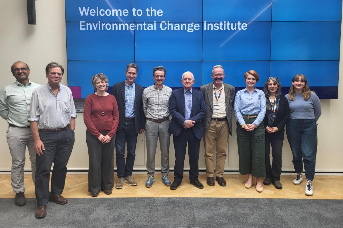 Barry Sheerman MP (centre right) with researchers at the Environmental Change Institute <i>(Image: Environmental Change Institute)</i>