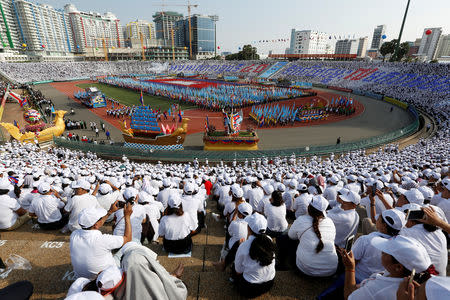 Cambodians attend an event to mark the 40th anniversary of the toppling of Pol Pot's Khmer Rouge regime at the Olympic stadium in Phnom Penh, Cambodia, January 7, 2019. REUTERS/Samrang Pring