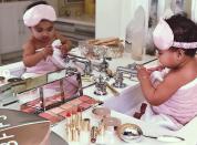 Someone's ready for a spa day! Perched in the sink, True played with her mom’s <a href="https://people.com/parents/khloe-kardashian-true-playing-makeup-becca-cosmetics/" rel="nofollow noopener" target="_blank" data-ylk="slk:extensive makeup collection;elm:context_link;itc:0;sec:content-canvas" class="link ">extensive makeup collection</a> while dressed in a fuzzy pink towel and matching eye mask. “True’s Makeup tutorial will be uploaded shortly,” Khloé joked on Instagram.