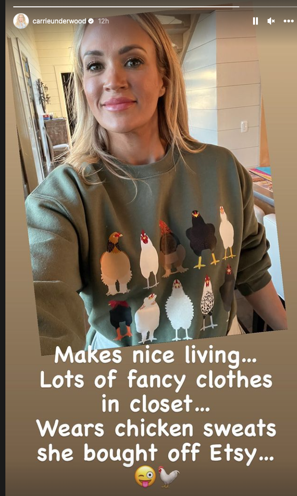 carrie underwood wearing green sweatshirt with chickens on it