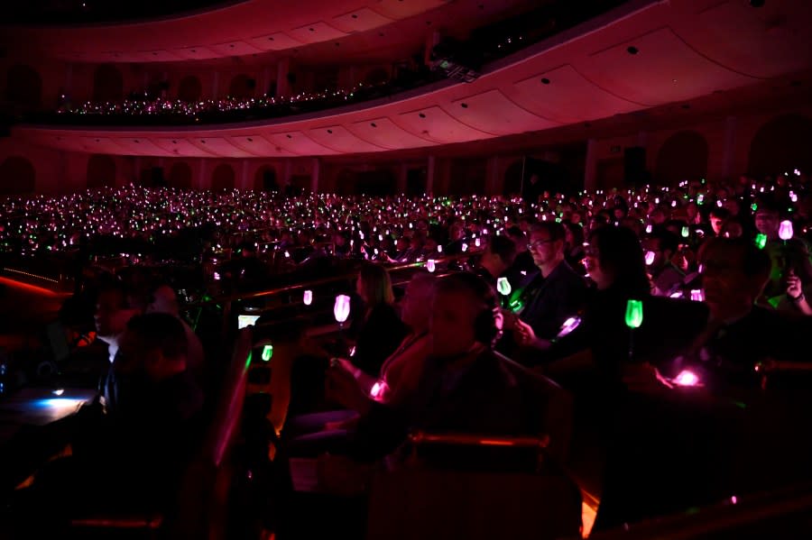 LAS VEGAS, NEVADA – APRIL 10: Audience members hold lights up for the movie “Wicked” during the Universal Pictures and Focus Features Presentation during CinemaCon 2024 at The Colosseum at Caesars Palace on April 10, 2024 in Las Vegas, Nevada. (Photo by David Becker/WireImage)