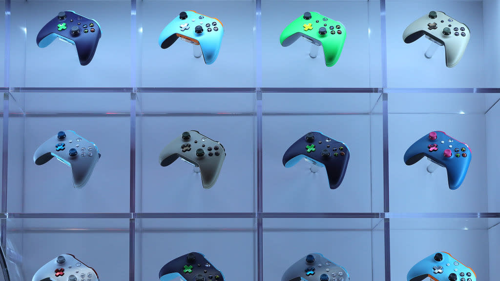  Wireless controllers for Xbox computer games sit on display on the Microsoft Corp. stand at the Gamescom gaming industry event in Cologne, Germany, on Tuesday, Aug. 21, 2018. 