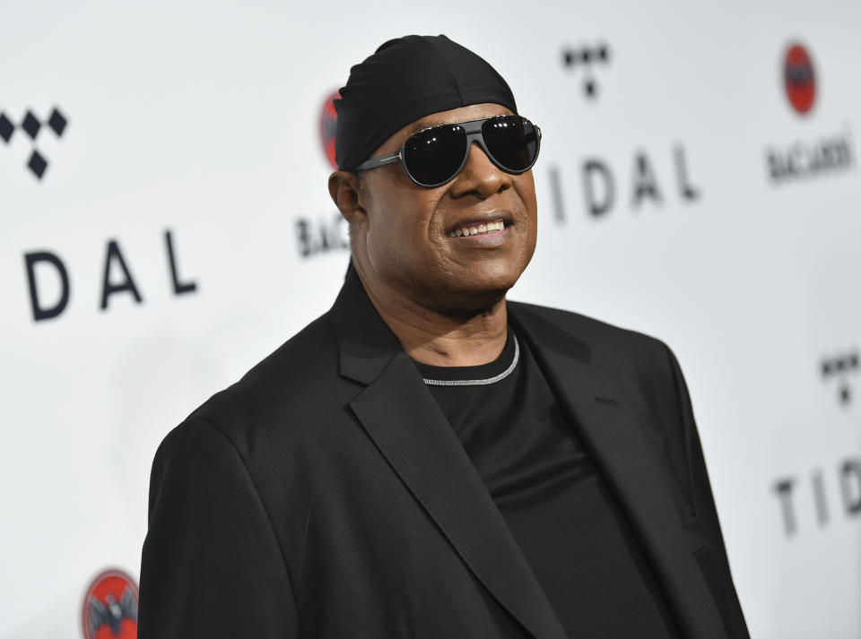 FILE - In this Oct. 17, 2017, file photo, Stevie Wonder attends the TIDAL X: Brooklyn 3rd Annual Benefit Concert in New York. Wonder released two new songs Tuesday reflecting the current times that he hopes inspires change. The music icon dropped the tracks “Where Is Our Love Song” and “Can’t Put It In the Hands of Fate,” which he also announced would be released through his new label, So What the Fuss Music, distributed through Universal Music Group’s Republic Records. (Photo by Evan Agostini/Invision/AP, File)