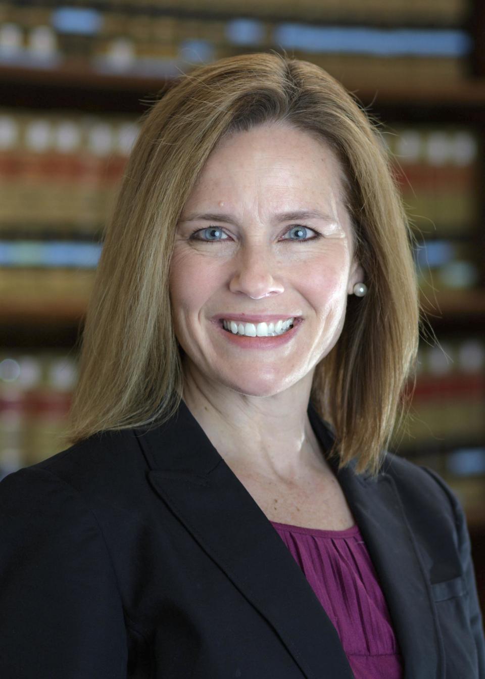 Judge Amy Coney Barrett is one of Mr Trump's top Supreme Court contendersUniversity of Notre Dame Law School via AP