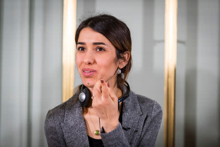 Nadia Murad answers a question during a a news conference with the 2018 Nobel Laureates at the Nobel Institute in Oslo, Norway December 9, 2018. Heiko Junge/NTB Scanpix/via REUTERS