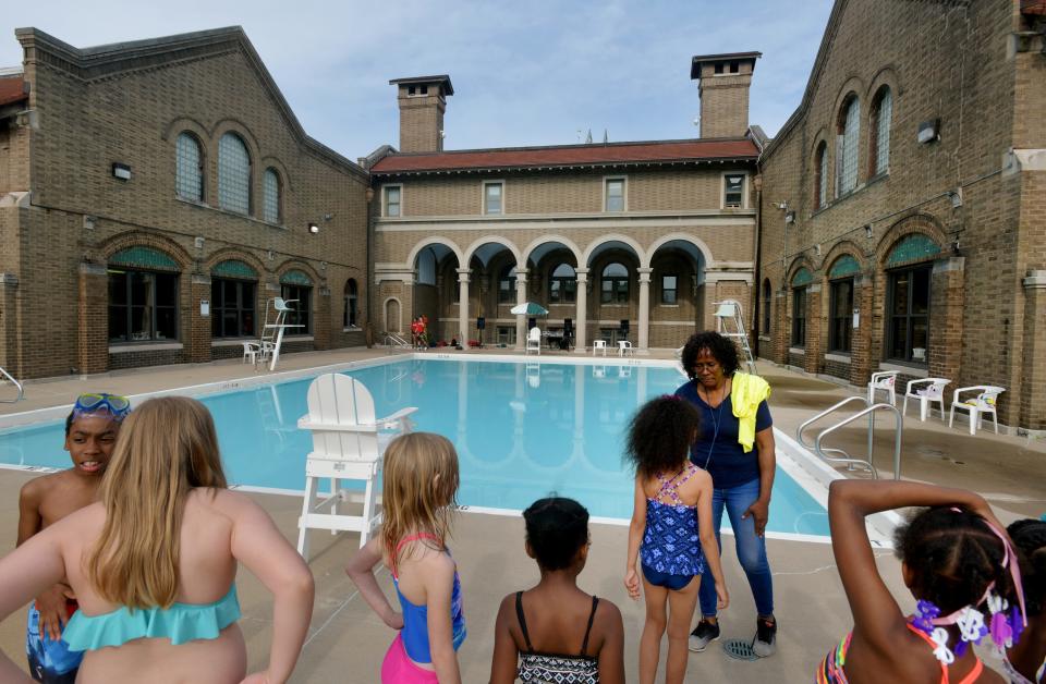 Kids attending the Streets Belong to Me youth rally wait for permission to enter the pool Tuesday, May 28, 2019 at Proctor Recreation Center in Peoria. [MATT DAYHOFF/JOURNAL STAR]