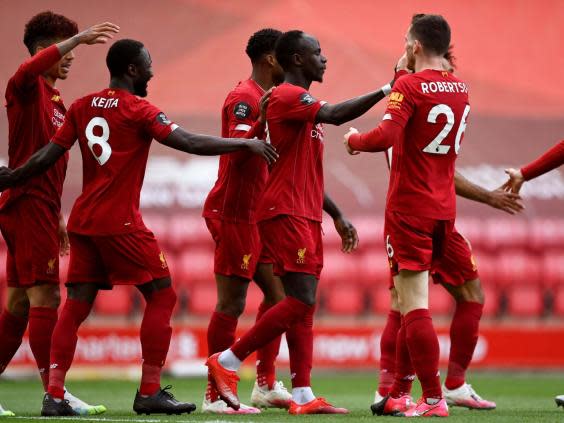 Liverpool celebrate Sadio Mane’s goal (AP)