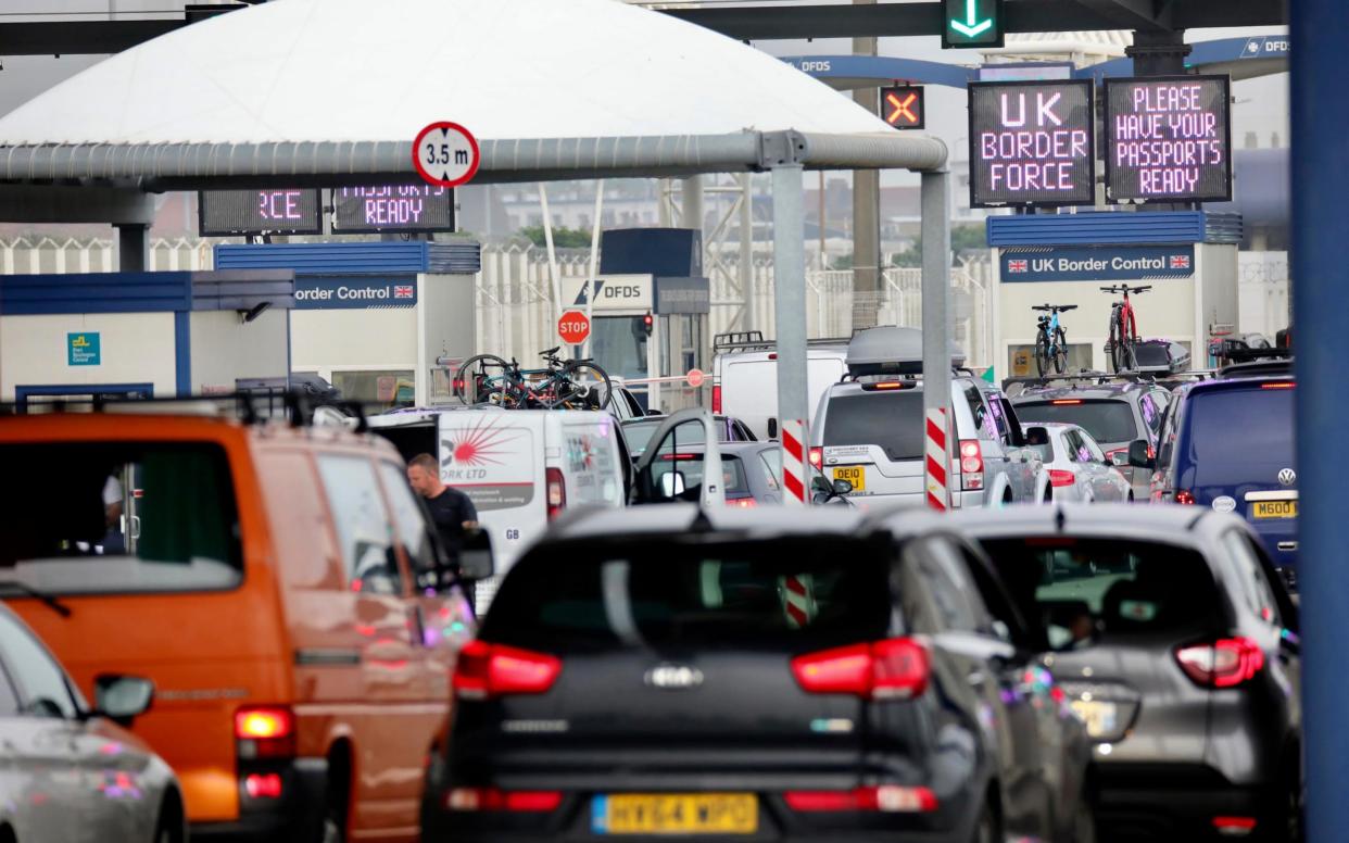 Travellers queue for the ferry on Friday before the deadline - AP