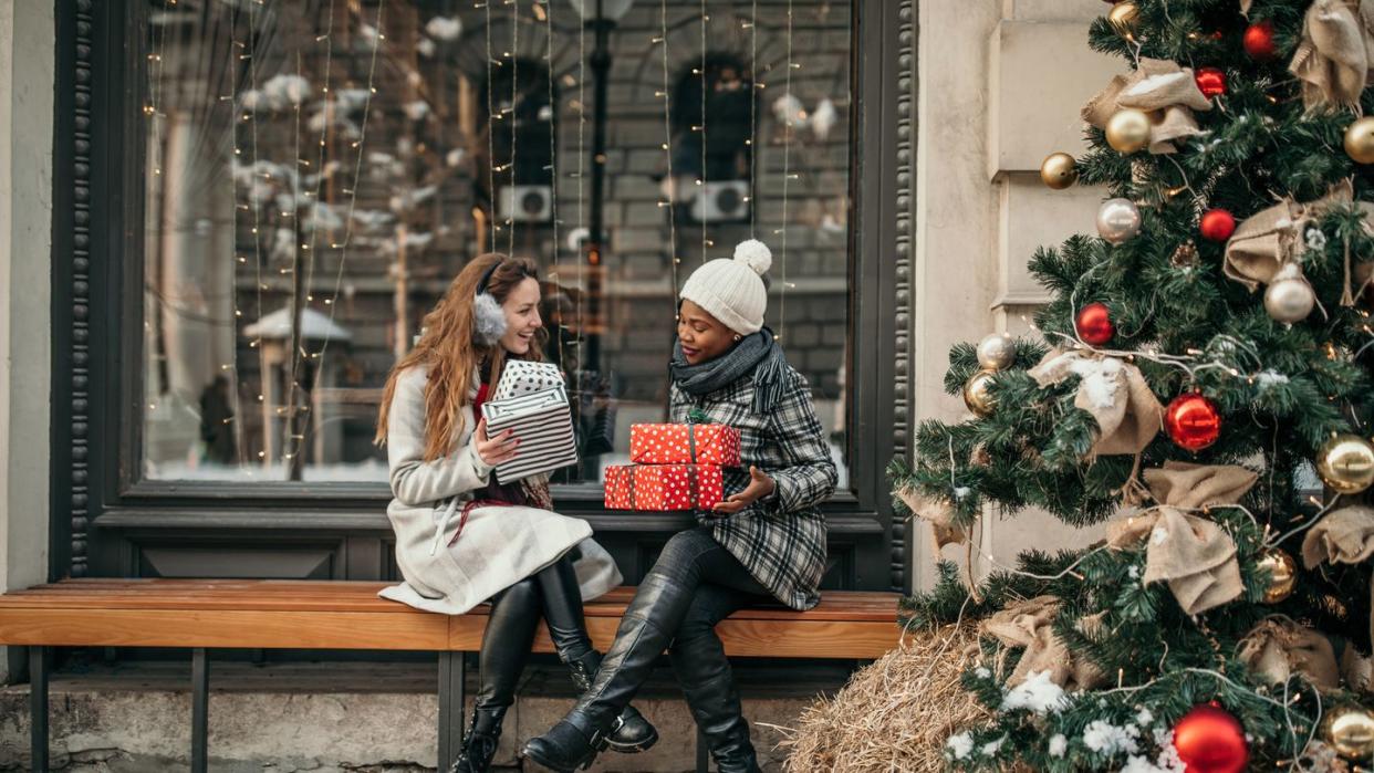two young women shopping for christmas