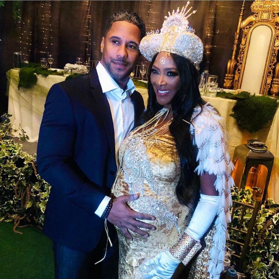 Marc Daly and Kenya Moore at her extravagant baby shower in October.