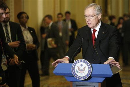 U.S. Senate Majority Leader Harry Reid (D-NV) addresses reporters at the U.S. Capitol in Washington, February 4, 2014. REUTERS/Jonathan Ernst