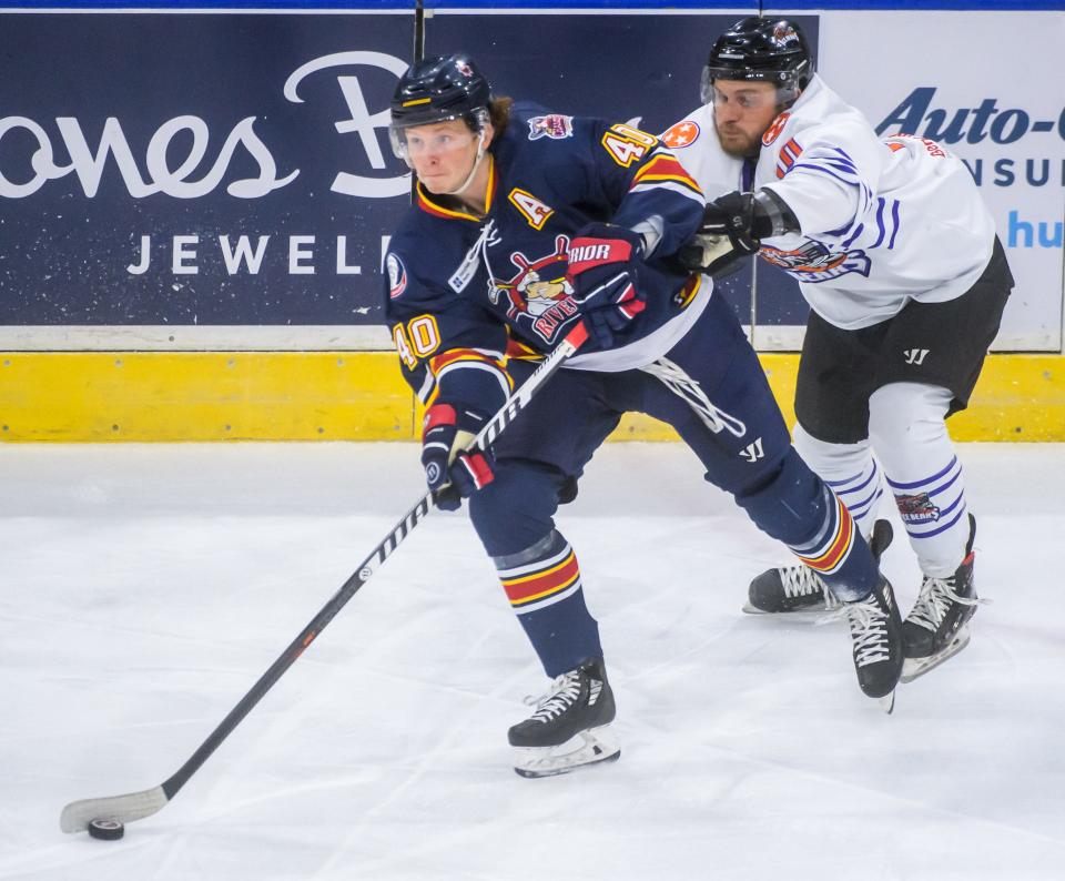 Peoria's JM Piotrowski (40) moves the puck against Knoxville in the second period Friday, Jan. 13, 2023 at Carver Arena in Peoria. The Rivermen fell to the Ice Bears 6-4.