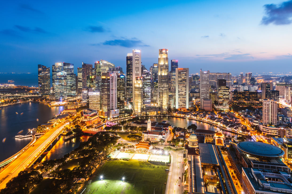 Elevated view of business district at sunset, Singapore