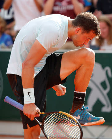 Tennis - French Open - Roland Garros, Paris, France - May 30, 2018 Bulgaria's Grigor Dimitrov celebrates winning his second round match against Jared Donaldson of the U.S. REUTERS/Charles Platiau