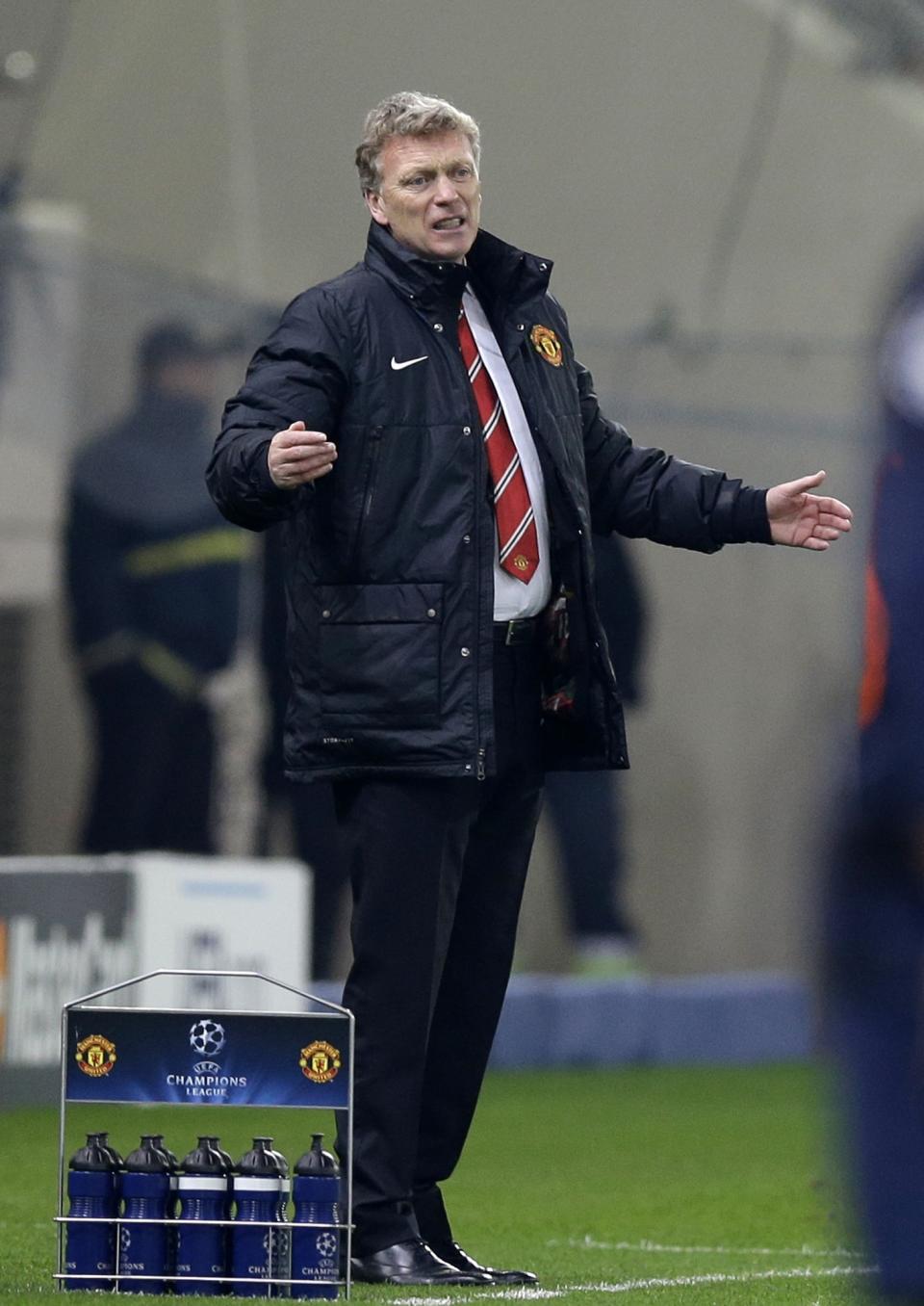Manchester United's coach David Moyes reacts after to a players' mistake during a Champions League, round of 16, first leg soccer match against Olympiakos at Georgios Karaiskakis stadium, in Piraeus port, near Athens, on Tuesday, Feb. 25, 2014. Olympiakos won 2-0. (AP Photo/Thanassis Stavrakis)