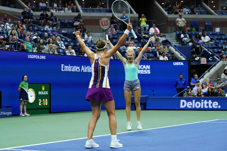 Barbora Krejcikova, of the Czech Republic, left, and Katerina Siniakova, of the Czech Republic celebrate defeating Taylor Townsend, of the United States, and Caty McNally, of the United States, in the final of the women's doubles at the U.S. Open tennis championships, Sunday, Sept. 11, 2022, in New York. (AP Photo/Matt Rourke)