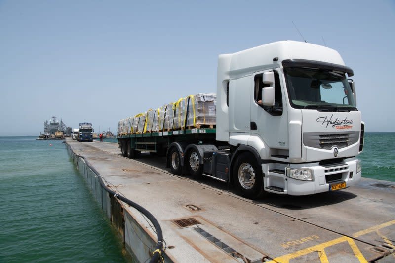 The Defense Department and U.S. Agency for International Development offices of inspector general said Thursday they are beginning a joint review of Gaza maritime corridor aid delivery efforts. Aid trucks pictured crossing the Trident Pier before entering Gaza May 17, 2024. File Photo by U.S. Army/UPI