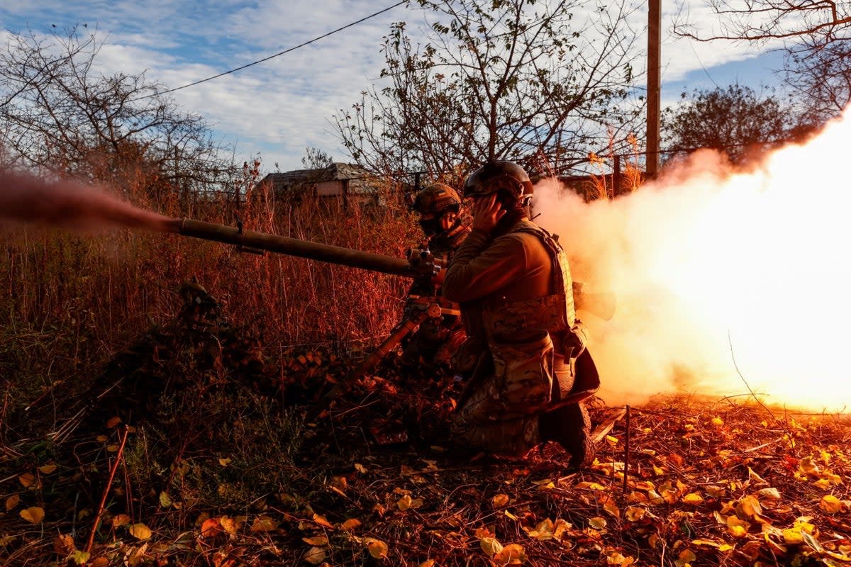 Members of Ukraine’s National Guard Omega Special Purpose fire an SPG-9 anti-tank grenade launcher toward Russian troops in Avdiivka (Reuters)