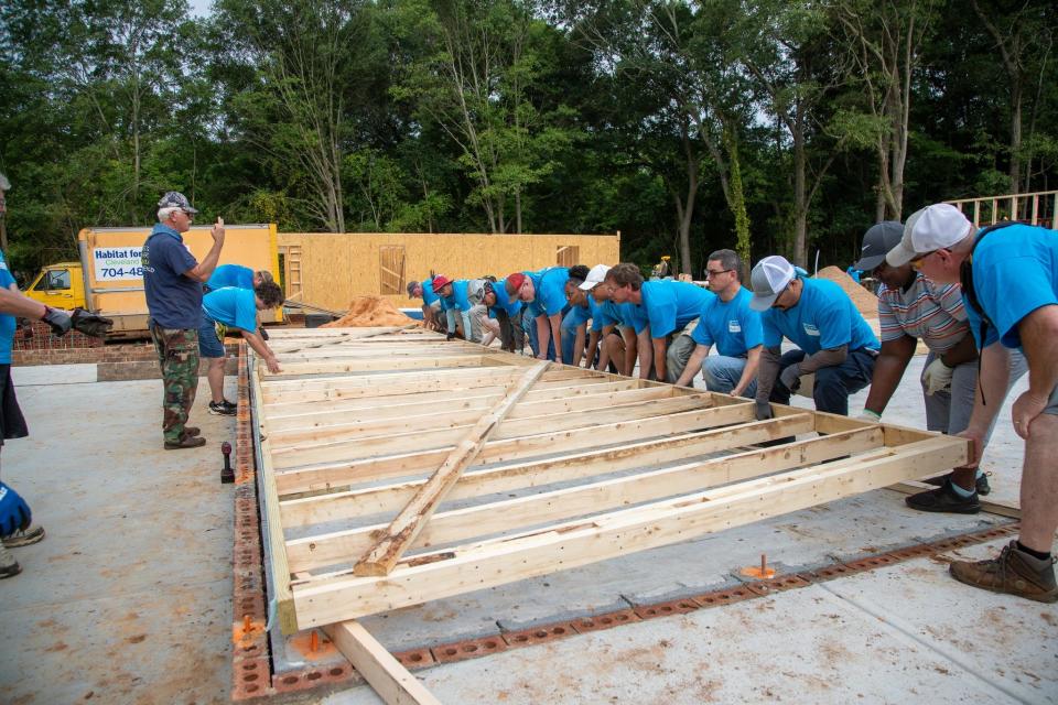 Five local churches recently partnered with Habitat for Humanity to work on new homes at Young Oak Square