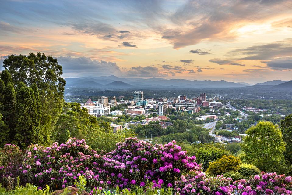 Asheville, North Carolina, is nestled among the Blue Ridge Mountains and surrounded by close to one million acres of wilderness areas and parks, including the famed Blue Ridge Parkway.