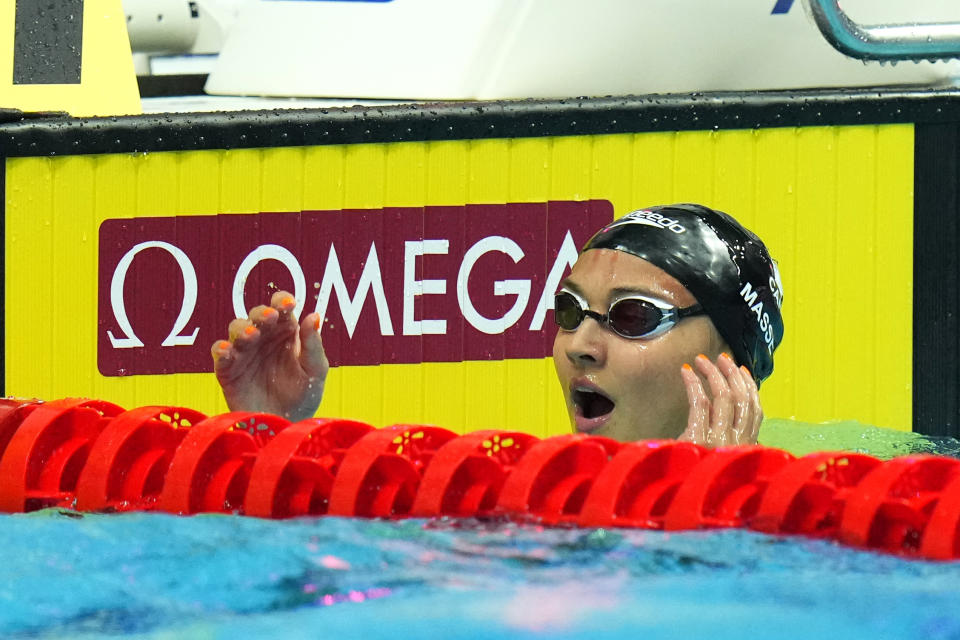 Kylie Masse of Canada reacts after winning the women's 50m backstroke at the 19th FINA World Championships in Budapest, Hungary, Wednesday, June 22, 2022. (AP Photo/Petr David Josek)