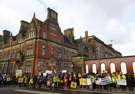 Demonstrators gather outside the County Hall during an anti-fracking protest in Preston, northern England January 28, 2015. REUTERS/Darren Staples