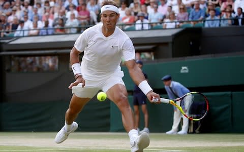 Nadal reaches for a forehand - Credit: Reuters