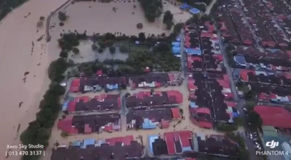 An aerial view shows the banks of a river overflowed after floodwater rose for more than 24 hours of incessant rain, in Kubang Semang, Bukit Mertajam, Penang