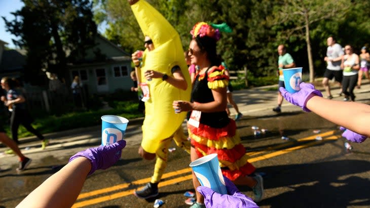 A runner, dressed as a banana, runs the Bolder Boulder 10k