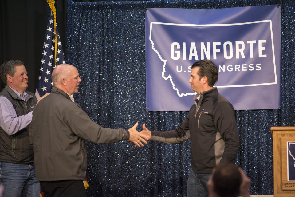 Republican Greg Gianforte, left, shakes hands with Donald Trump Jr. at a campaign event in Bozeman, Montana, in April. (Photo: William Campbell via Getty Images)