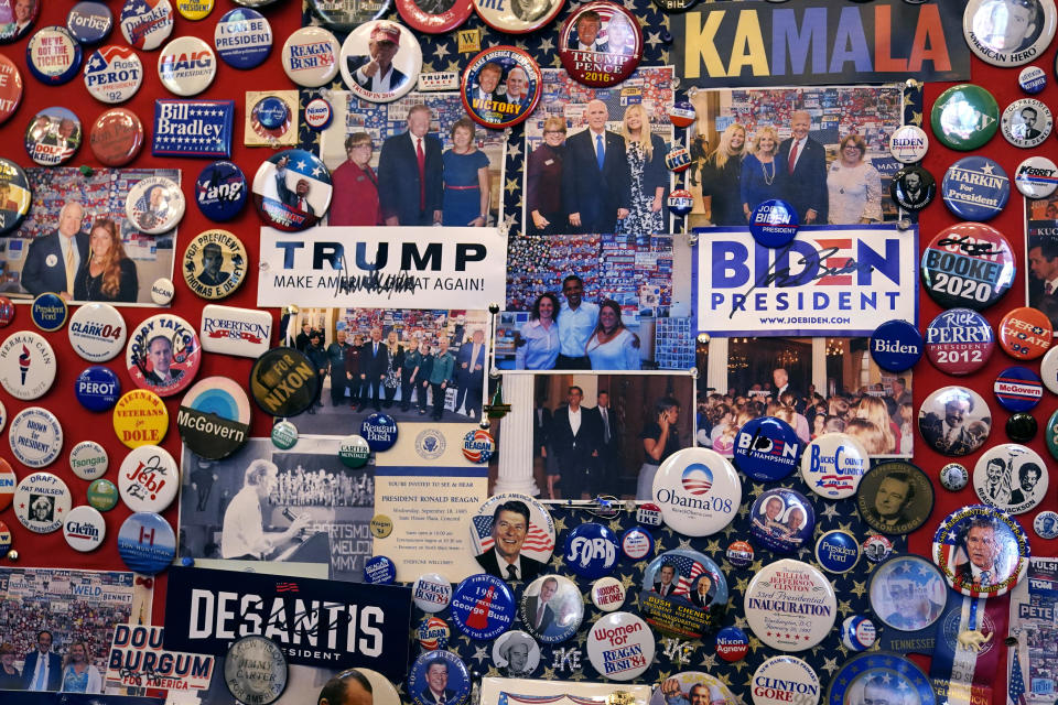 Current and past presidential candidate buttons, stickers and memorabilia are displayed on a wall in the visitors center at the New Hampshire Statehouse, Thursday, Oct. 12, 2023, in Concord, N.H. / Credit: Charles Krupa / AP