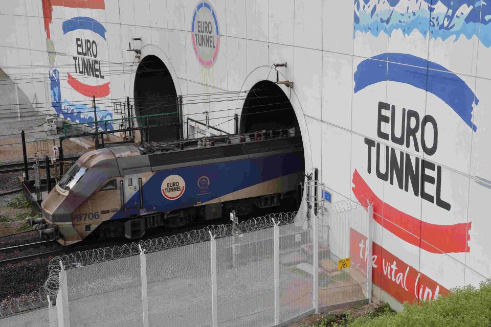 An Eurotunnel freight shuttle exists the Channel Tunnel in Coquelles, near Calais, northern France, October 20, 2015. Eurotunnel is expected to report Q3 results this week. REUTERS/Pascal Rossignol