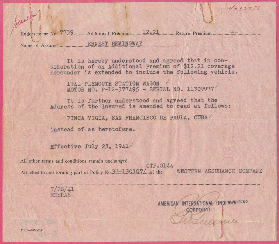 This photo released Tuesday, Feb. 11, 2014 by the John F. Kennedy Presidential Library and Museum in Boston, shows an insurance document related to Ernest Hemingway’s 1941 Plymouth station wagon, one of many new items from his former Cuban estate being made available at the museum. To date, the Kennedy Library has the world’s largest collection of Hemingway’s life and work, containing most of his manuscript material. (AP Photo/John F. Kennedy Library and Museum) NO SALES.