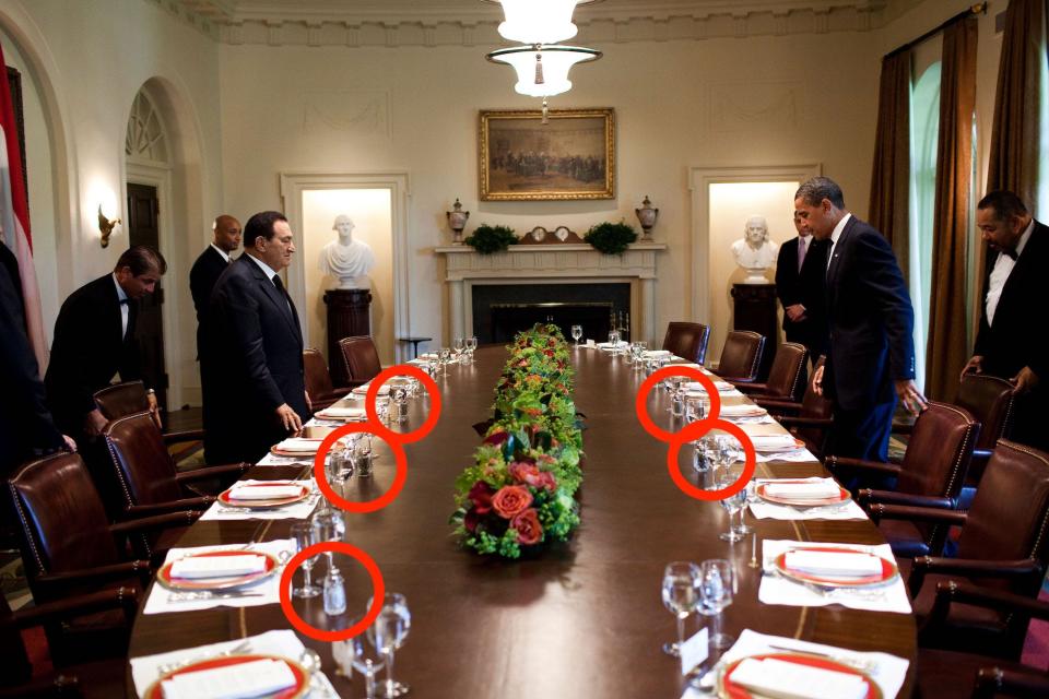 President Barack Obama and Egyptian President Hosni Mubarak approach the table at the start of a working lunch in the Cabinet Room of the White House, August 18, 2009.