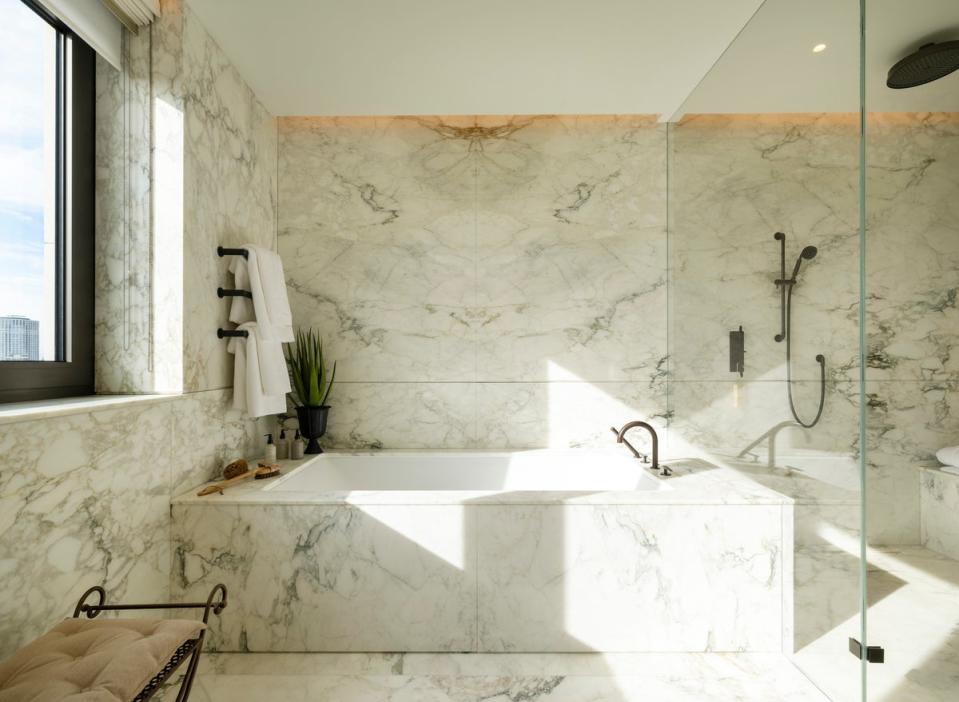 The bathrooms are clad in bookmatched marble (LandCap/Tony Murray)