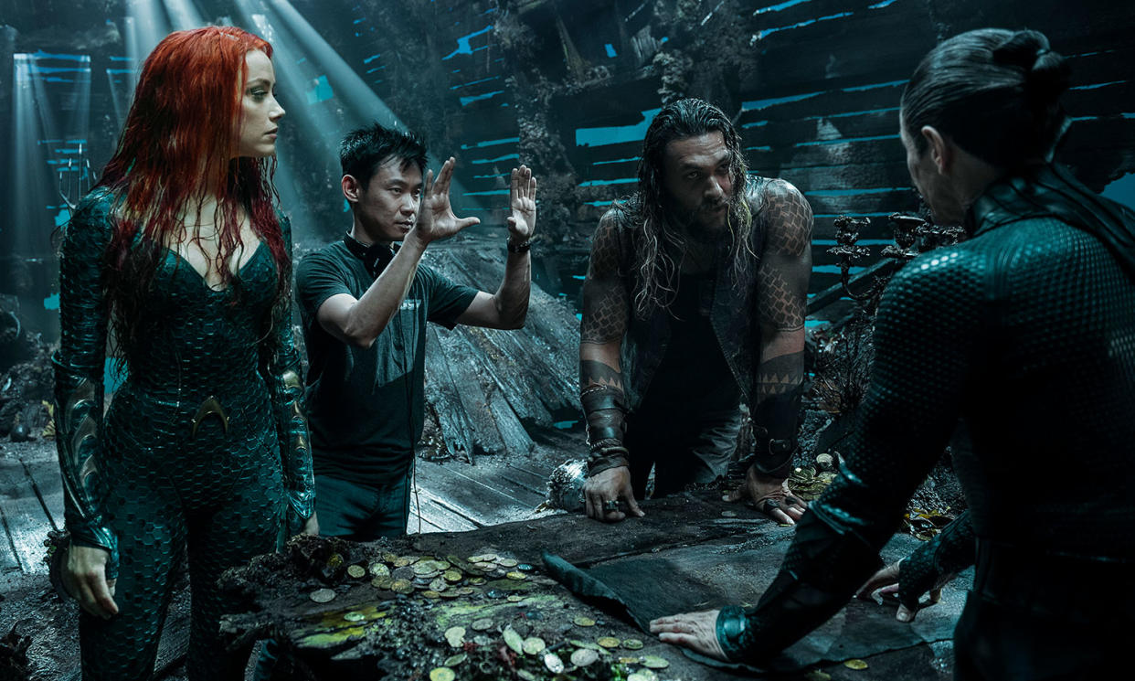 Amber Heard, James Wan, Jason Momoa, and Patrick Wilson on the set of <i>Aquaman</i> at Village Roadshow Studios in Gold Coast, Queensland. (Warner Bros.)