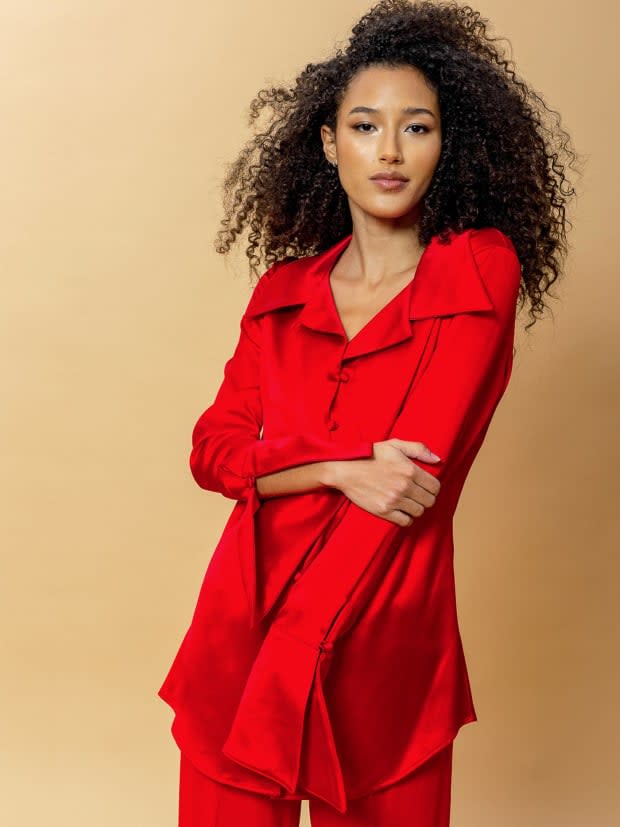 <p>Leigh New York Sabrina Top in Cherry, $350, <a href="https://www.leighnewyork.com/collections/all/products/sabrina-blouse-in-cherry" rel="nofollow noopener" target="_blank" data-ylk="slk:available here;elm:context_link;itc:0;sec:content-canvas" class="link ">available here </a>(sizes XS-XL or custom). </p>