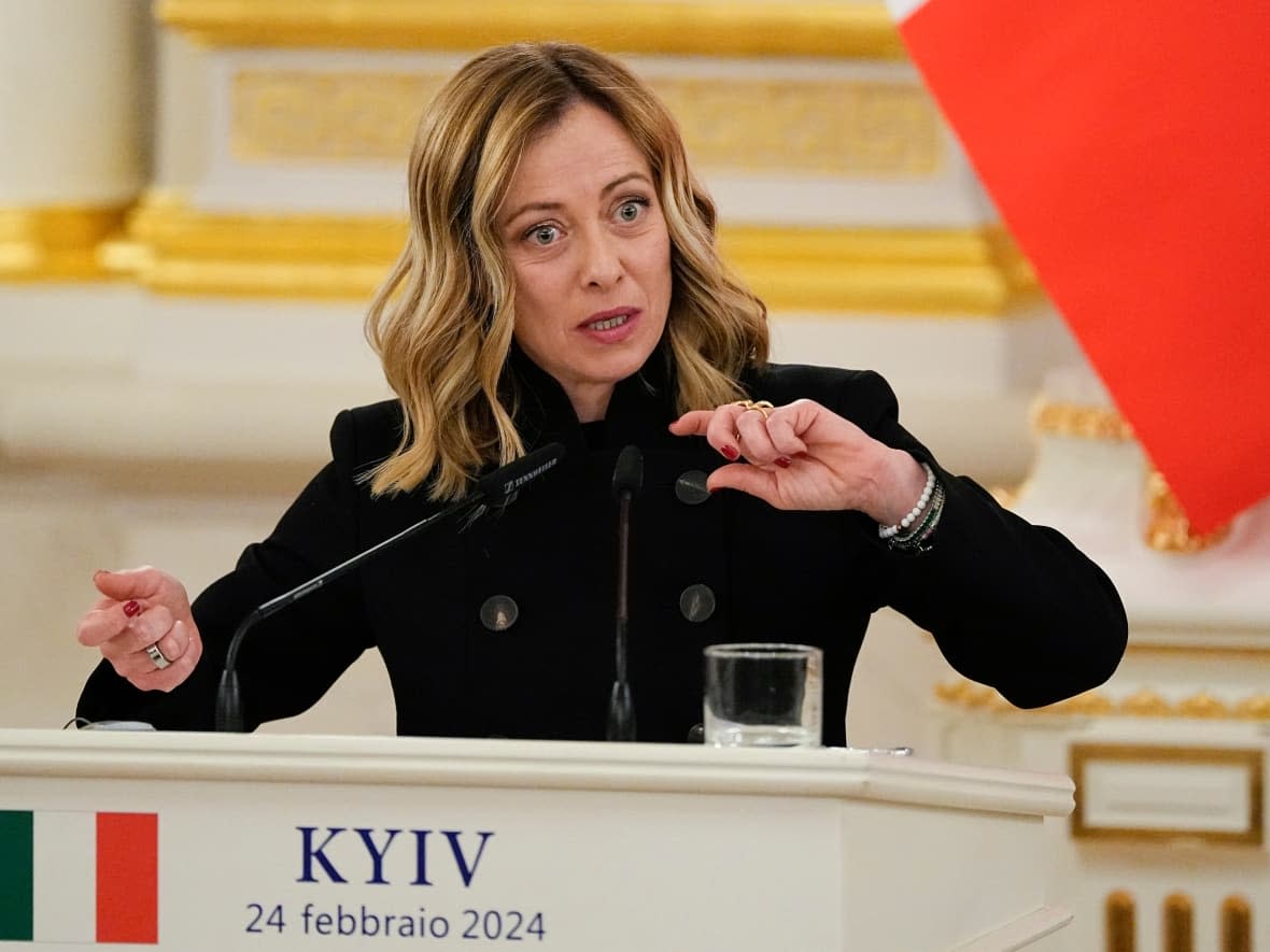 Italy's Premier Giorgia Meloni speaks during a press conference at the Mariinskiy Palace in Kyiv on Feb. 24. Meloni will visit Canada to meet with Prime Minister Justin Trudeau on Saturday.  (Efrem Lukatsky/The Associated Press - image credit)