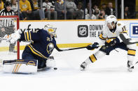 Buffalo Sabres goaltender Linus Ullmark (35), of Sweden, blocks a shot by Nashville Predators right wing Craig Smith (15) during the second period of an NHL hockey game Saturday, Jan. 18, 2020, in Nashville, Tenn. (AP Photo/Mark Zaleski)