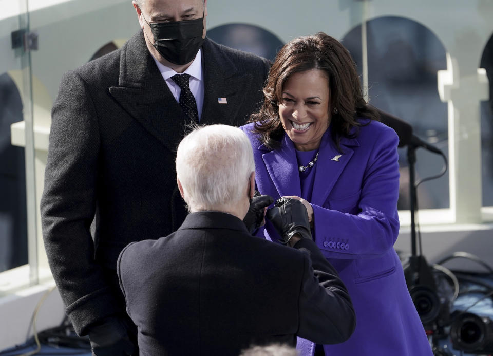 Vice President Kamala Harris bumps fists with President-elect Joe Biden after she was sworn in during the inauguration, Wednesday, Jan. 20, 2021, at the U.S. Capitol in Washington. (Greg Nash/Pool Photo via AP)