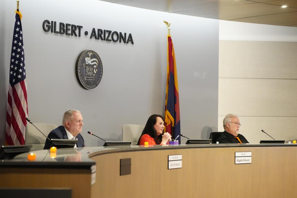 Jan. 9, 2024; Gilbert, Ariz; USA; Vice Mayor Scott Anderson, Mayor Brigette Peterson and councilmember Jim Torgeson listen to public comments during a Gilbert Town Hall.