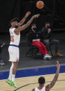 New York Knicks forward Reggie Bullock (25) takes a 3-point shot during the second quarter against the Detroit Pistons in an NBA basketball game Thursday, March 4, 2021, in New York. (Wendell Cruz/Pool Photo via AP)